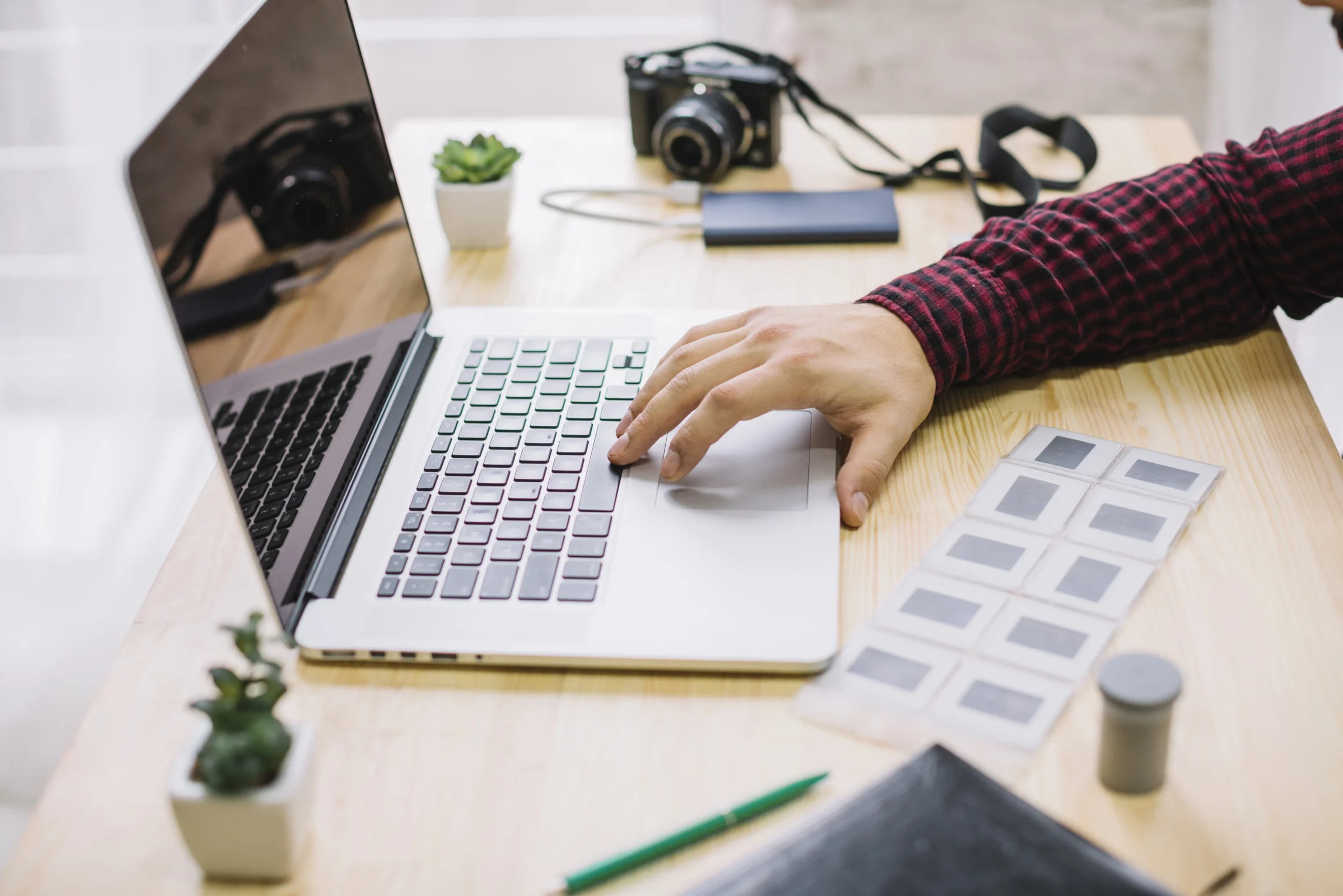 Photographer Using Laptop