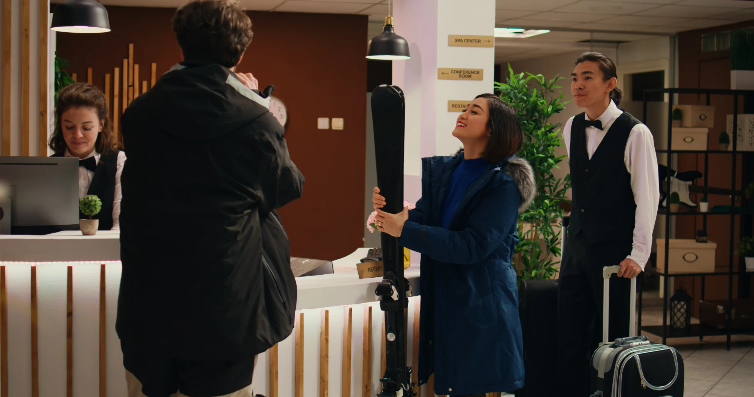 Receptionist Assists Athletic People