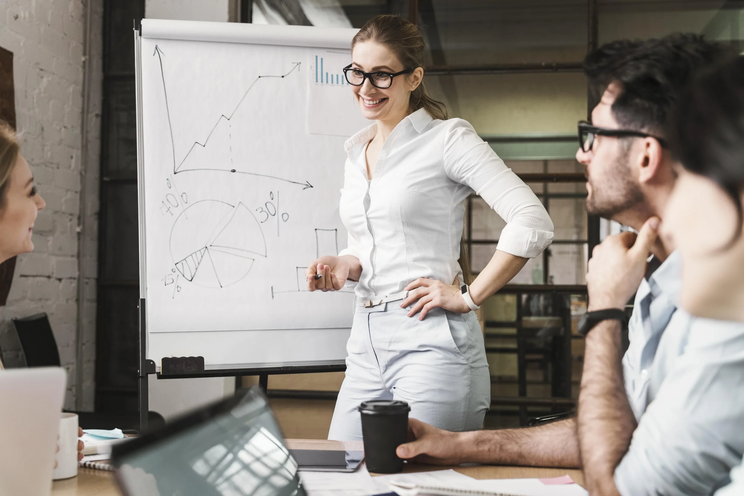 Businesswoman With Glasses Meeting Presentation With Her Peers